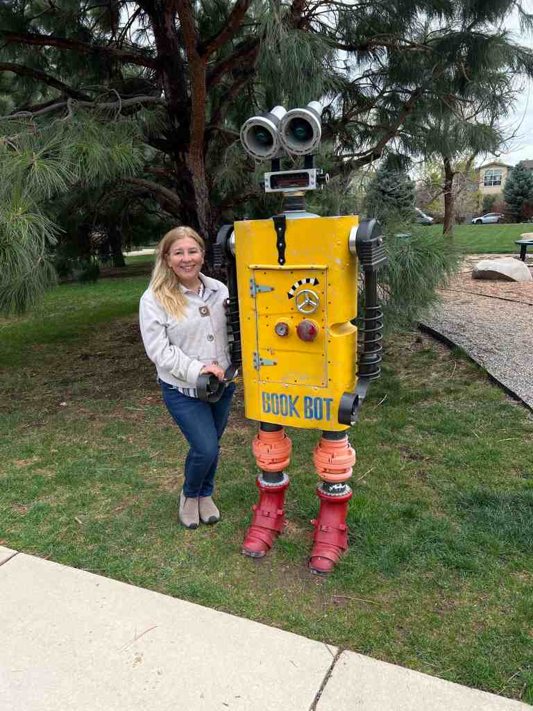 Author Laura Roettiger and Book Bot